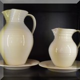 P01. Simon Pearce pitchers and plates.